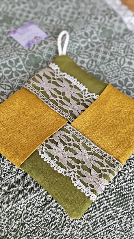 Silto trauku turētājs zaļš/dzeltens